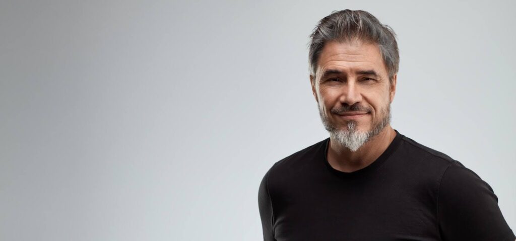 A man with healthy facial hair after a beard restoration in Tennessee.